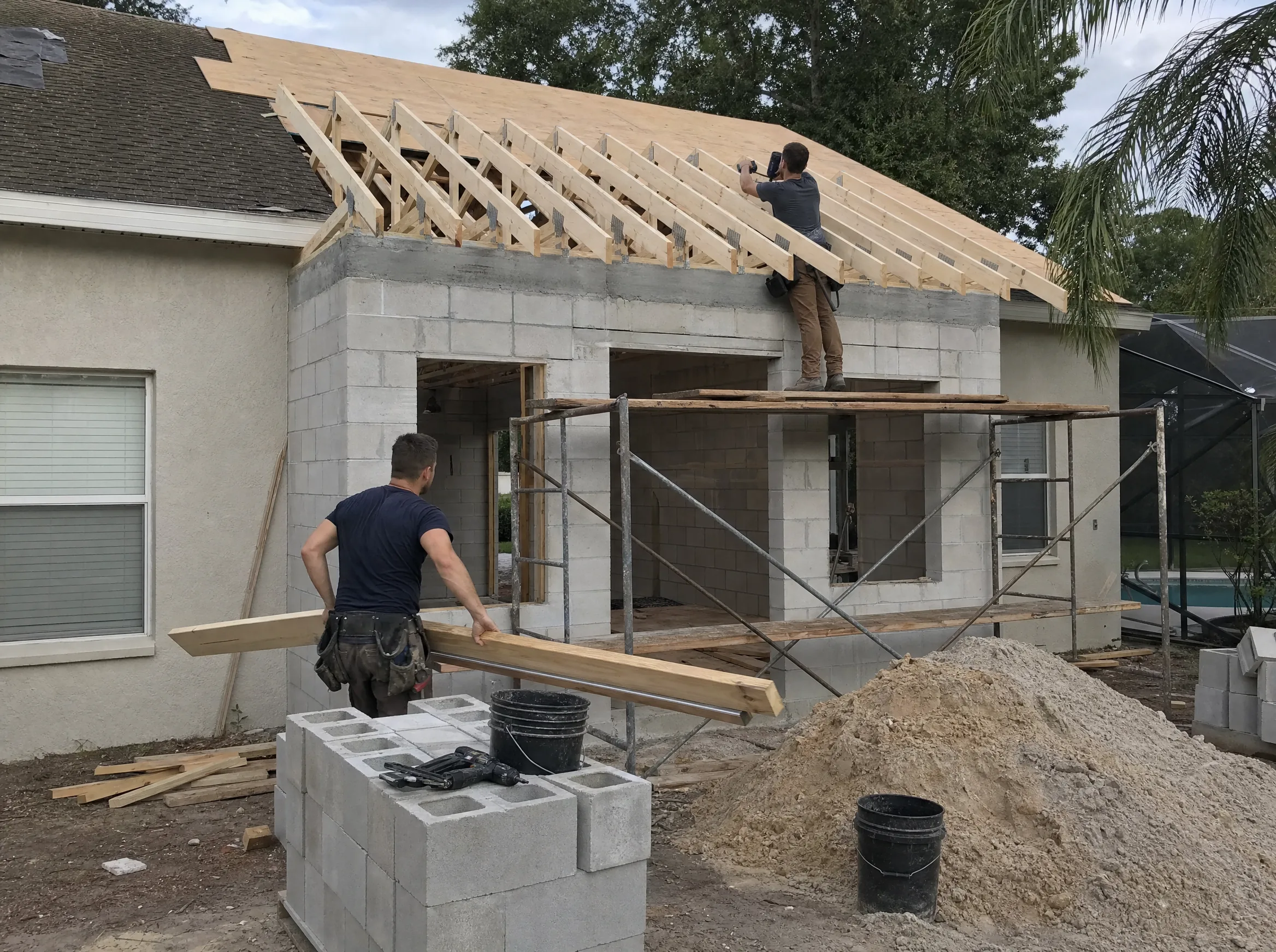 Concrete block and wood framing for a room addition on the back of a Florida home