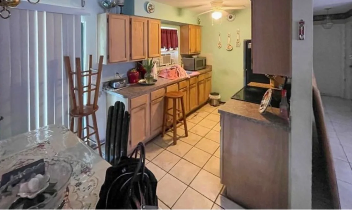 Before: Kitchen before the remodel: cramped dated kitchen