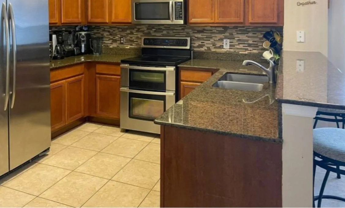 Before: Kitchen before the remodel: cherry cabinets