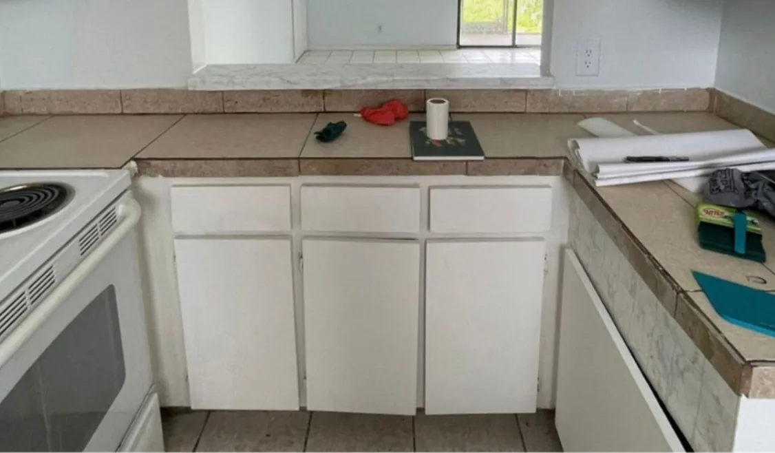 Before: Kitchen before the remodel: old laminate kitchen