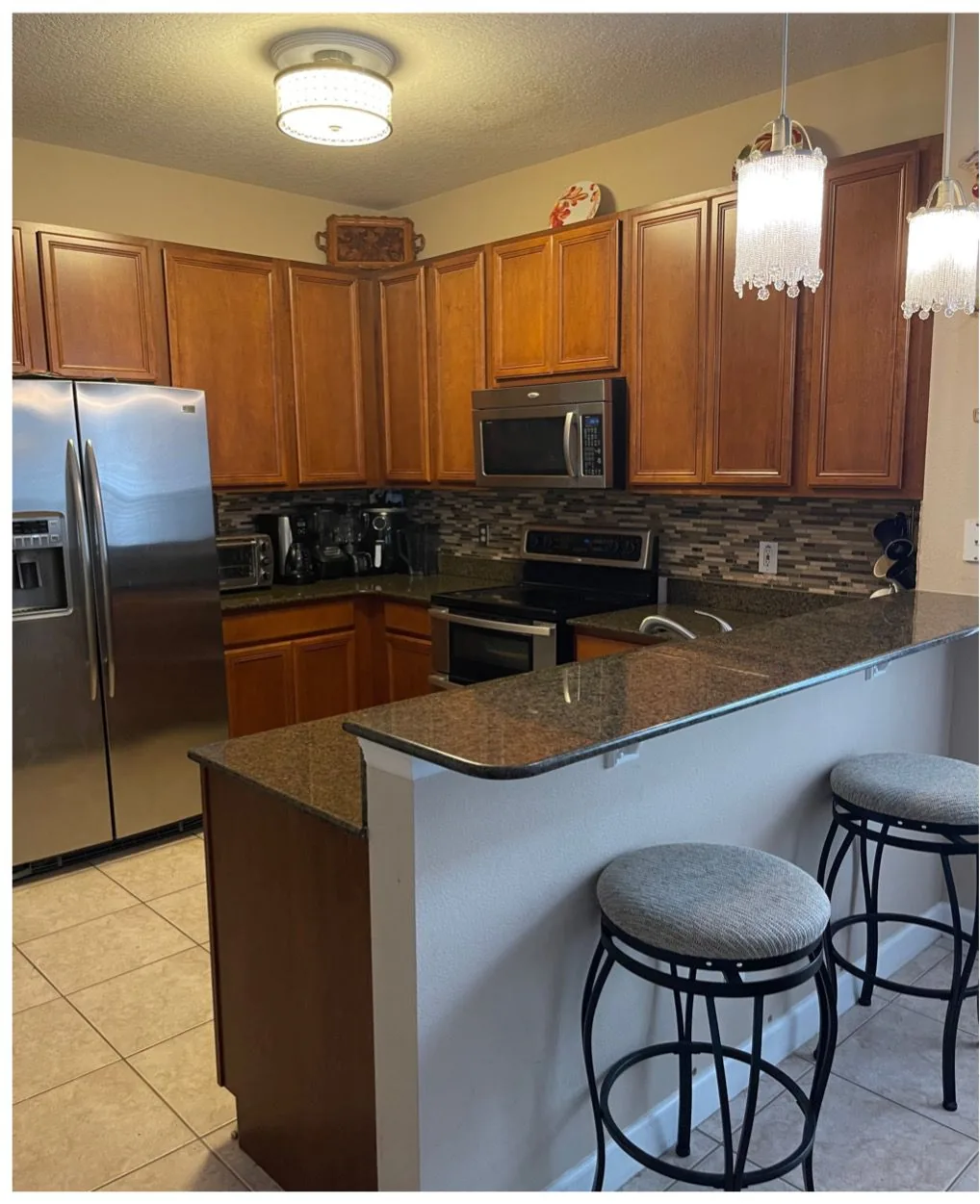 Before: Kitchen before the remodel: cherry cabinets